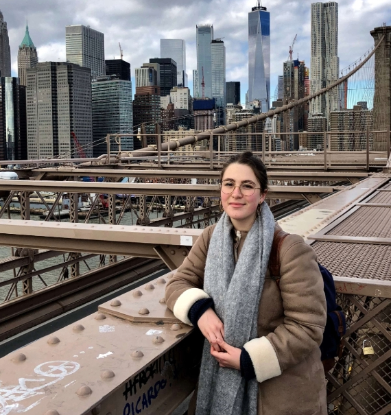 FoondaMate co-founder, Tao Boyle, standing against New York City skyline